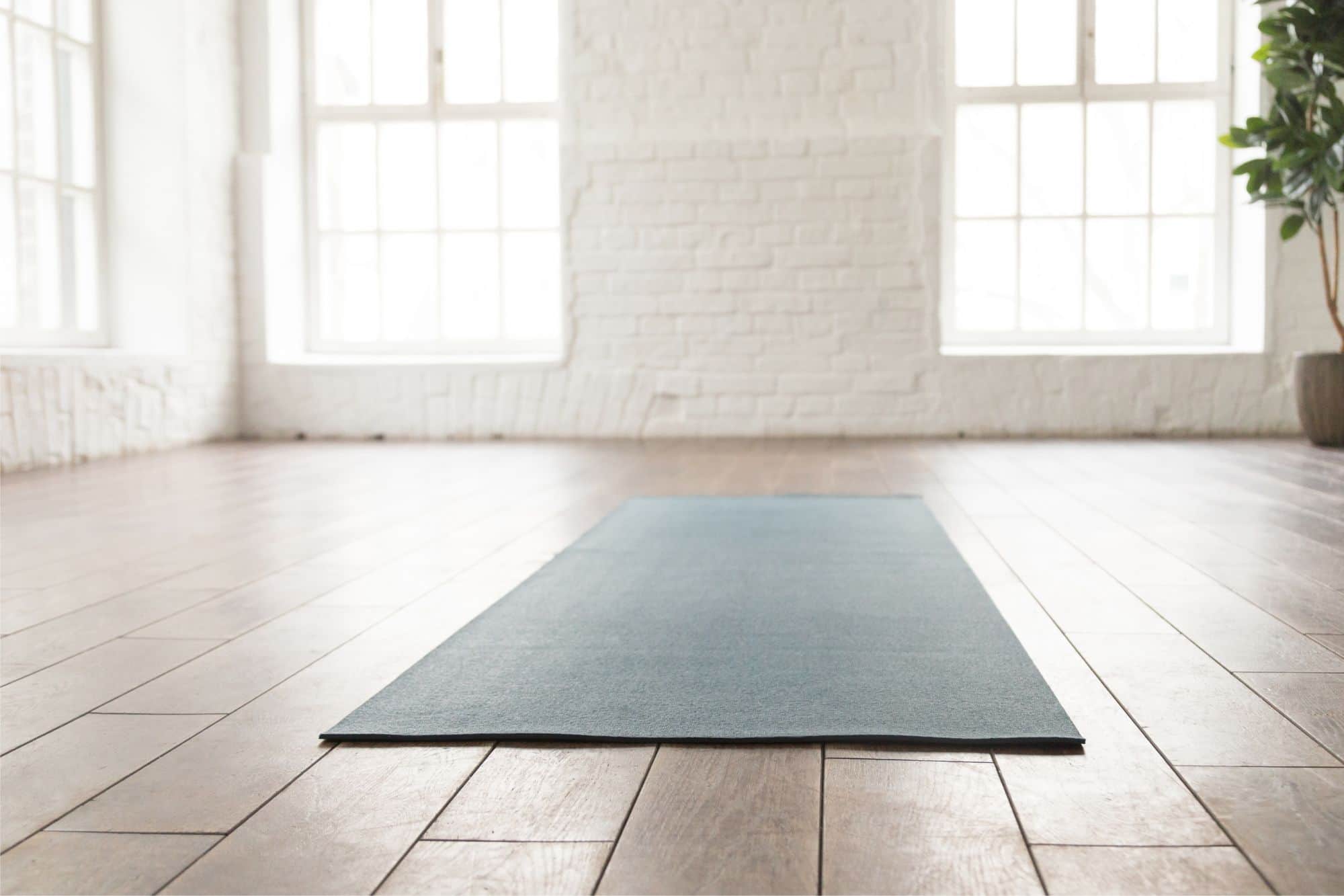 Empty yoga mat in a studio