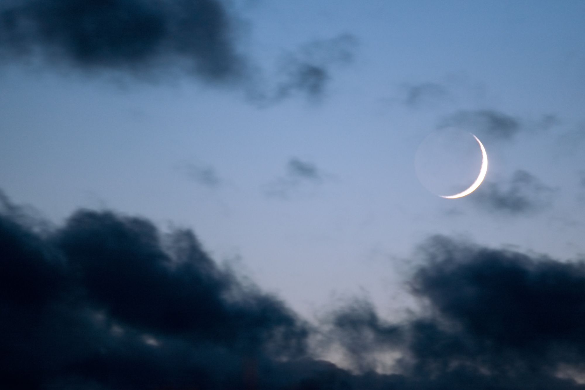 New Moon in the night sky